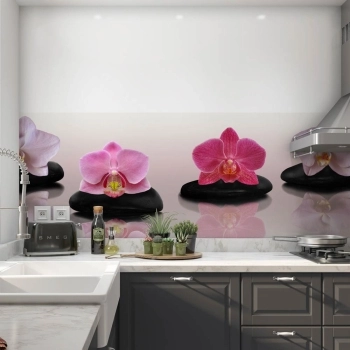 Küchenrückwand Folie Bunte Orchideen auf Massagestein